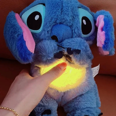Peluche Stitch respirante avec berceuse apaisante